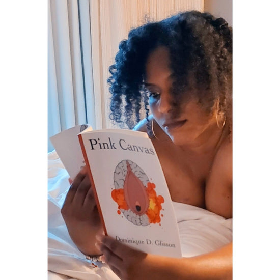 Woman reading Pink Canvas by Dominique D. Glisson
